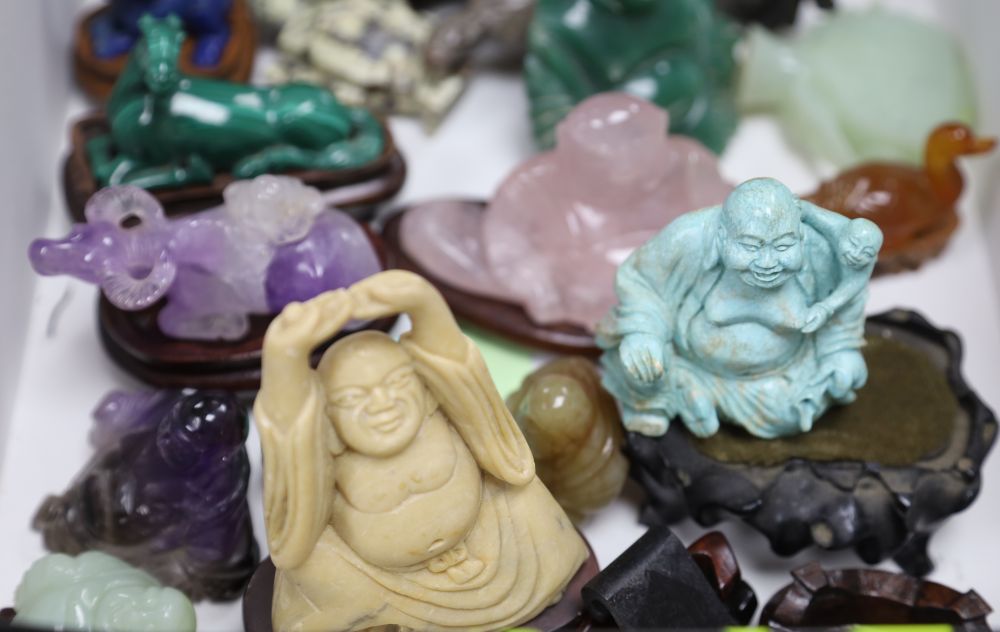 A group of Chinese hardstone carvings, in a soapstone dish